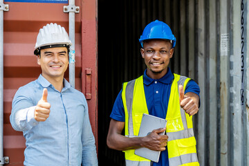 Workers and manager thumbs up after successful delivery of goods onto the ship, Where they are located in a harbor area with a lot of containers