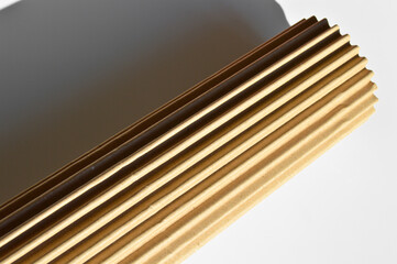 Brown and beige colored corrugated cardboard detail, roll cardboard