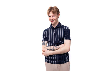 fashionable trendy young white-haired man in a blue polo on a white background with copy space