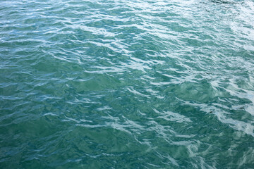 Blue sea water surface texture. Blue ocean summer