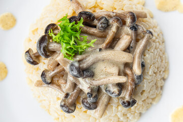rice with mushrooms risotto healthy meal food snack on the table copy space food background rustic top view keto or paleo diet veggie vegan or vegetarian food no meat
