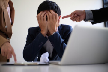 Bullying with an out of control boss shouting to a stressed employee. Anger issues and stress concept.