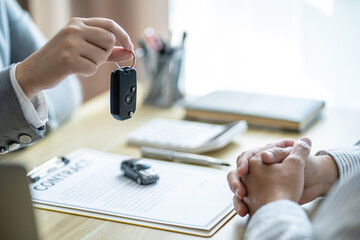 Loss Adjuster Insurance Agent Inspecting Damaged Car. .Sales manager giving advice application form document considering mortgage loan offer for car  insurance