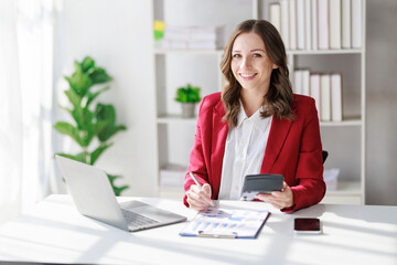 Concept of business office woman working,Businesswoman smile while working about her invesment plan...