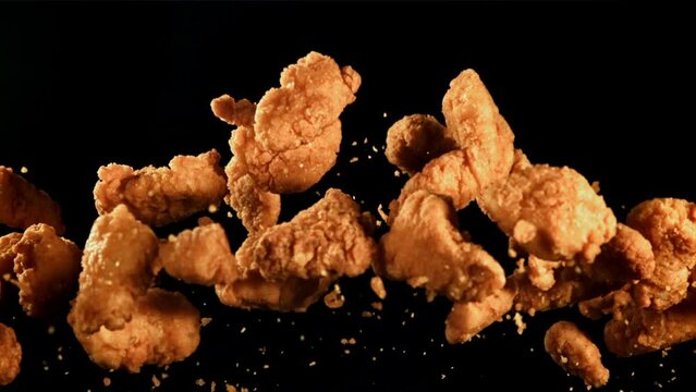 Nuggets fly up and fall down. Filmed is slow motion 1000 fps. High quality FullHD footage