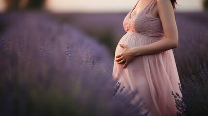 A pregnant woman in a pink dress stands in a field of lavender., generative ai - obrazy, fototapety, plakaty