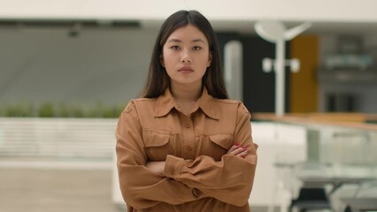 Portrait Asian businesswoman chinese japanese woman strong independent female director leader feminism pose arms crossed. Korean ethnic girl cafe worker waitress small business owner looking at camera