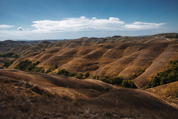 A beautiful view of indonesian paradise at Wairinding hills at Waingapu, East Sumba, East Nusa Tenggara, Indonesia.