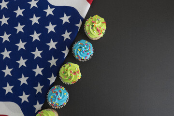 Independence Day 4th of July. Congratulations background. American Constitution Day. Postcard in the American tradition. Cupcakes decorated with symbols of America