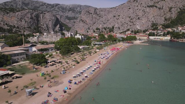 Aerial panoramic drone view over Cetina River of impressive Omis town, Velika beach, Omis, Adriatic Sea, Dalmatia coast