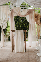 Beautiful wedding venue with white and beige details decoration