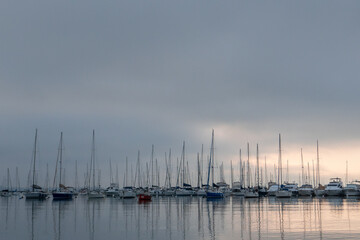 Fototapeta premium Sunrise at the Puertito del Buceo in the coastal Rambla of Montevideo capital of Uruguay in 2023.