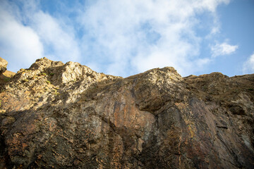 Surreal and beautiful cliffs at Perranporth Beach during low tide.