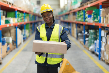 A female worker sorting goods in a warehouse.