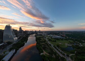 Town Lake, aka Ladybird Lake overlooking three bridges: Mopac Union Pacific Rail Road Bridge, Pfluger pedestrian Bridge, Lamar Boulevard Bridge. Plus the west Austin hills in 

the background.