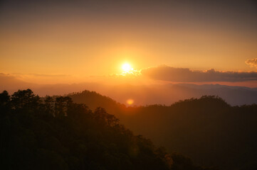 Sunset over mountain in tropical rainforest at national park