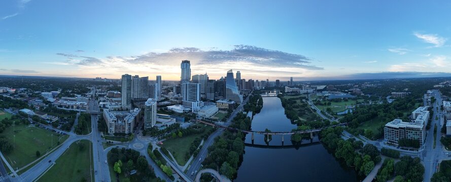 Town Lake, aka Ladybird Lake overlooking three bridges: Mopac Union Pacific Rail Road Bridge, Pfluger pedestrian Bridge, Lamar Boulevard Bridge. Plus the west Austin hills in 

the background.