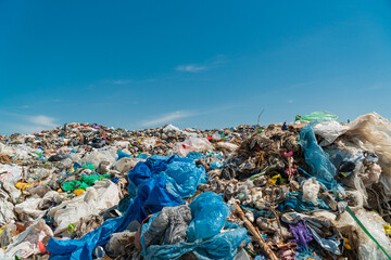 Open-air landfill. Plastic and polyethylene waste - obrazy, fototapety, plakaty