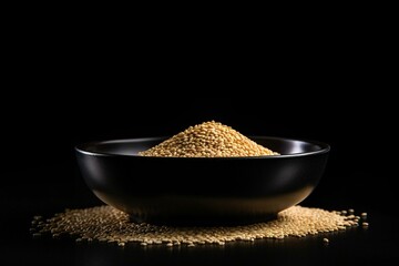 Sesame seeds in black bowl on white background viewed from the side. Generative AI