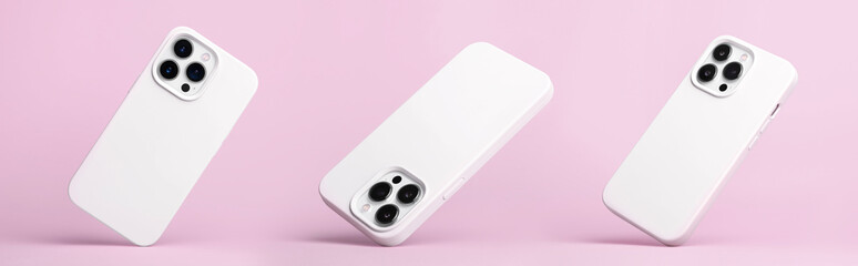 set of three iPhone 13 Pro and 14 in white silicone case falling down in different angles, back...