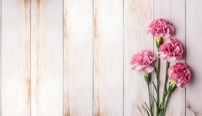 Pink flowers on a white wooden table