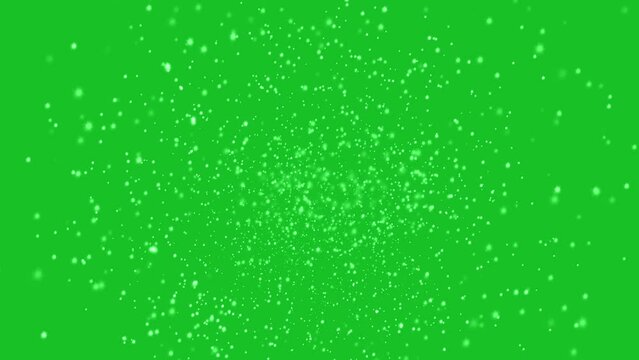 White particles motion graphic effects on green screen background. 