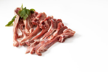 Raw lamb ribs, isolated on a white background.Delicious lamb rib, succulent and tender. Carnivorous pleasure in every bite. An irresistible delicacy that awakens the senses.