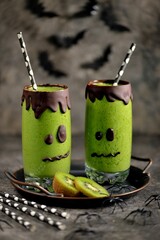 Healthy yogurt, kiwi, celery and spinach smoothie funny idea for Halloween party