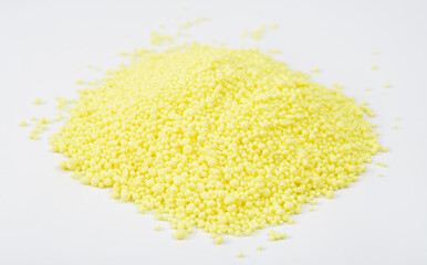 Granulated Sulfur or sulphur on white background