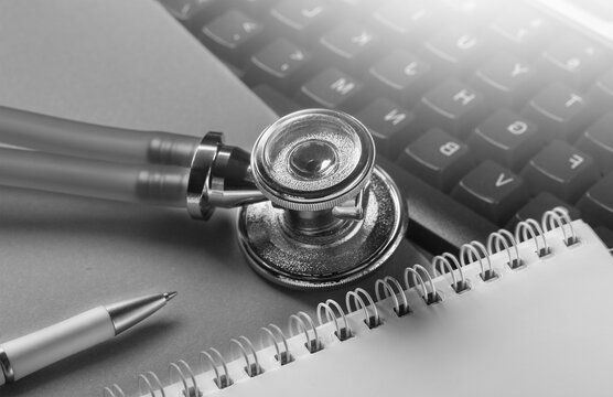 Online medicine stethoscope on computer keyboard. Modern medicine.щщ