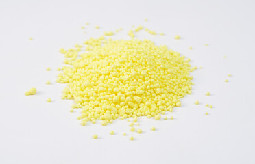 Granulated Sulfur or sulphur on white background
