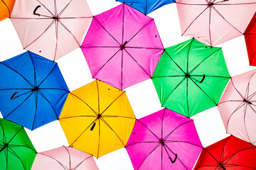 set of interlocking colorful umbrellas seen from below