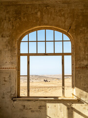 Fototapeta na wymiar Architectural views of sand filled abandoned homes in diamond mining ghost town.