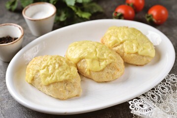 Dietary chicken cutlets baked in the oven with cheese