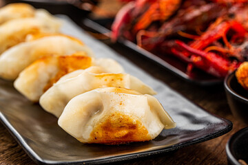 Fried dumplings with crayfish filling