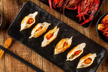 Fried dumplings with crayfish filling