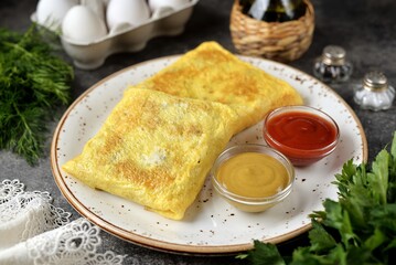 Beef schnitzel in an omelet.