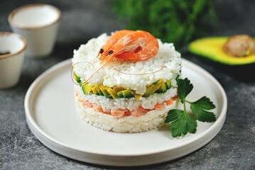 Delicious healthy salad of rice, shrimp, mozzarella and avocado.