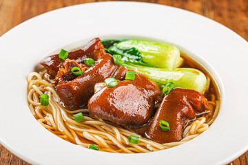 A bowl of pork knuckle noodles