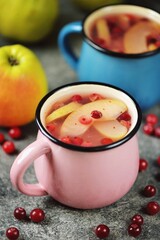 Compote with apples and cranberries. Healthy homemade drink. 