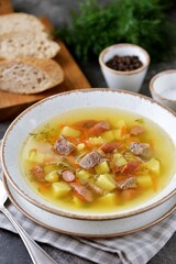 Pea soup with smoked sausages and beef