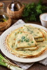 Pancakes with green onions and dill.