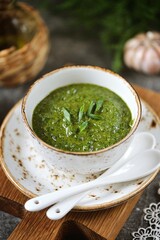 Homemade pesto sauce with parsley and hot peppers.