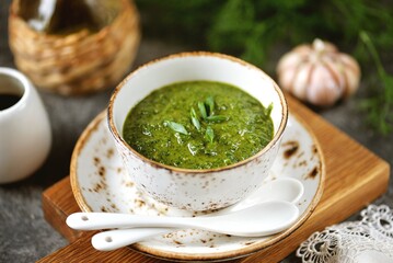 Homemade pesto sauce with parsley and hot peppers.