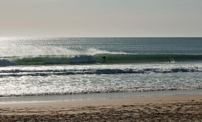 Surfing at Supertubos Beach in Peniche, Portugal - 605763262