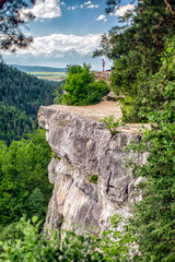 Hiker on the rock in Slovak paradise. Beautiful mountain scenery. Viewpoint called Tomasovsky vyhlad