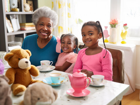 Black grandmother with two young granddaughters having a tea party. Sitting together, looking at the camera, and smiling.  Shallow dof with focus on faces. Created with Generative AI technology.