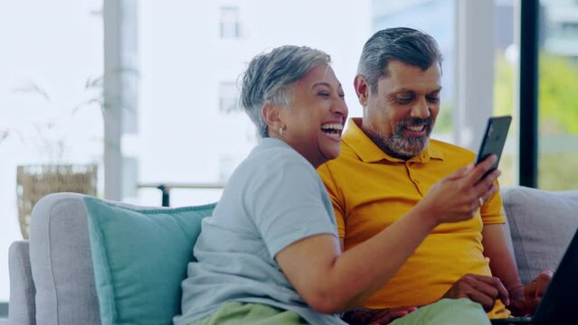 Talking, phone and happy elderly couple laughing at online meme, funny joke or social media comic on living room sofa. Love bond, fun and relax old man, woman or people laugh at mobile comedy video