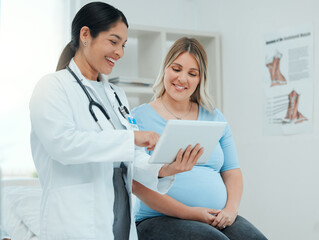 Healthcare, tablet and pregnant woman at a prenatal consultation for health in a medical clinic. Wellness, maternity and female pregnancy doctor speaking to a mother with a digital mobile in hospital