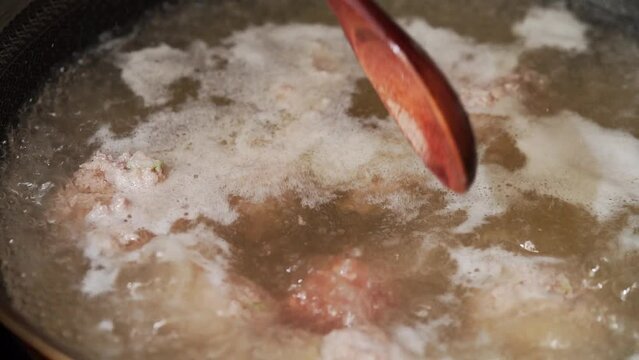 The cooking process of characteristic Chinese food pak choi meatball soup